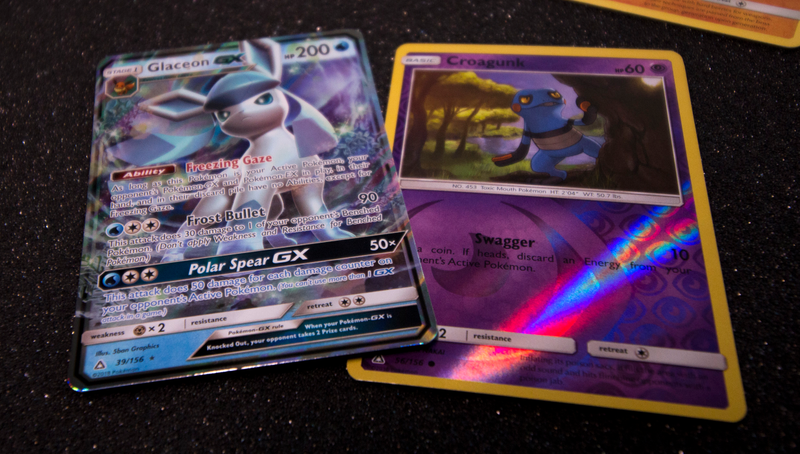 Illustration for article titled Let's Open Some Pokemon Ultra Prism Cards And See If There's Anything Good